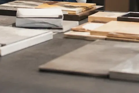 Material samples and specification boards arranged for strategic supplier sourcing